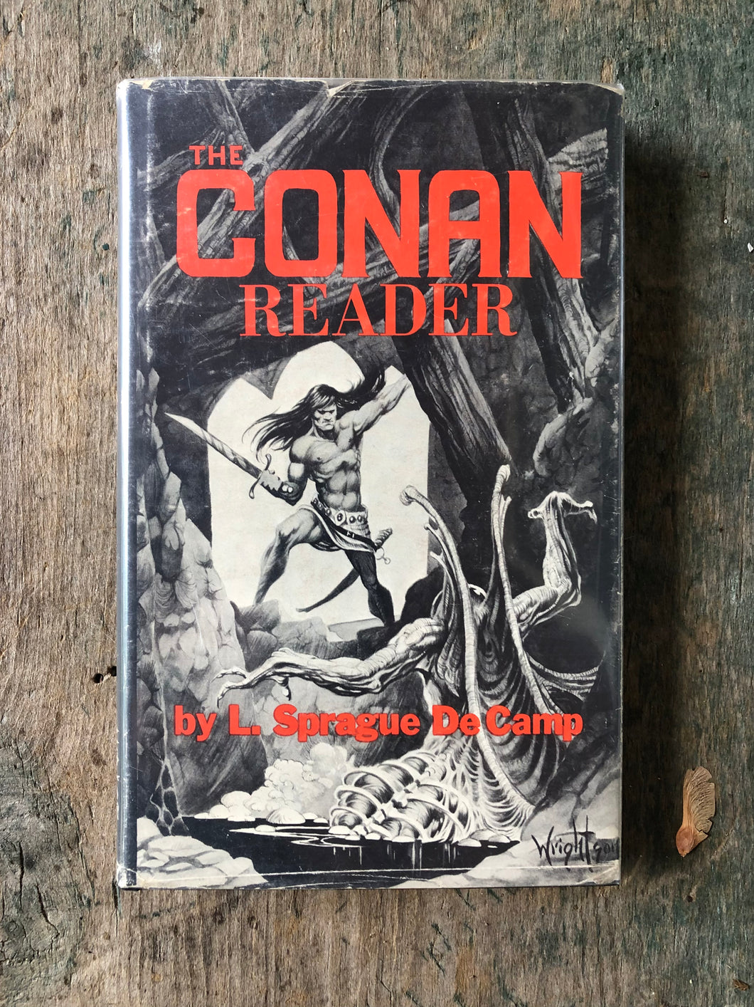 The Conan Reader by L. Sprague DeCamp and Illustrated by Roy G. Krenkel